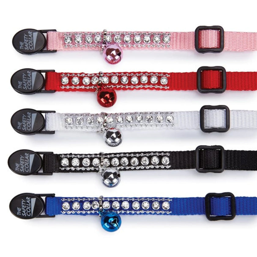 East Side Collection rhinestone cat collars in pink, red, white, black, and blue with adjustable straps and bells