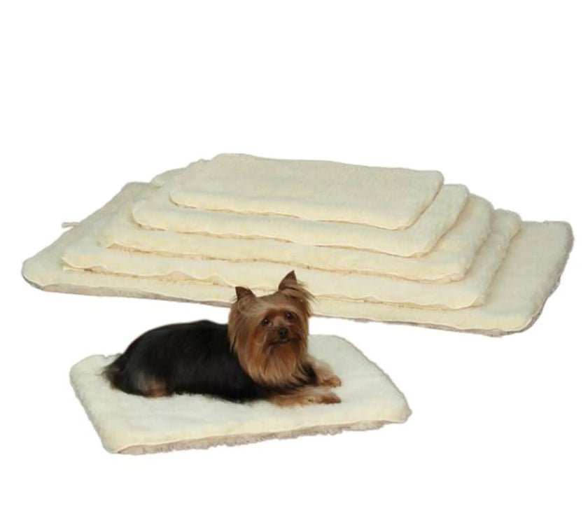 Slumber Pet Double Sided Sherpa Mat in various sizes with a small dog resting on the smallest mat.