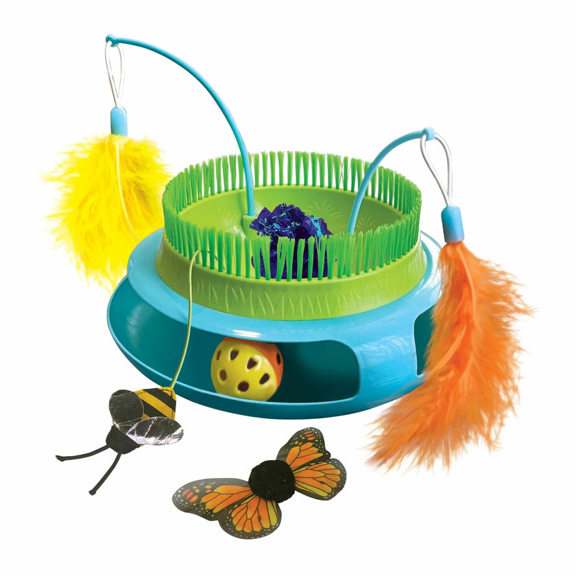 KONG interactive cat playground toy with wobbling base, rattling ball, faux grass, dangling feather wands, catnip-stuffed bee, crackle ball, and butterfly for multi-sensory enrichment and active play.