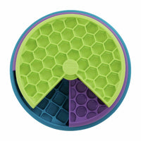 Nina Ottosson interactive multicolored dog puzzle toy with three spinning layers for treats and mental stimulation